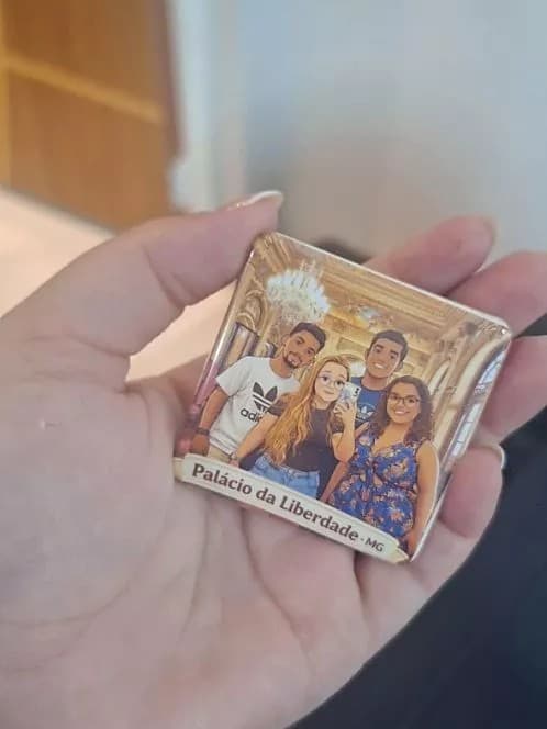 Cliente feliz com ímãs personalizados